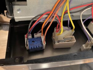 Stove control panel inside, showing two burner switches