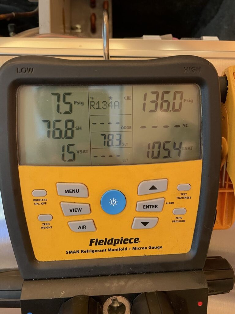Digital refrigerant gauges reading system pressures