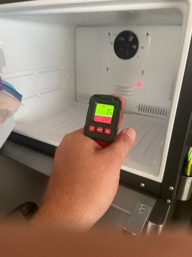 Infrared thermometer reading inside a warm freezer