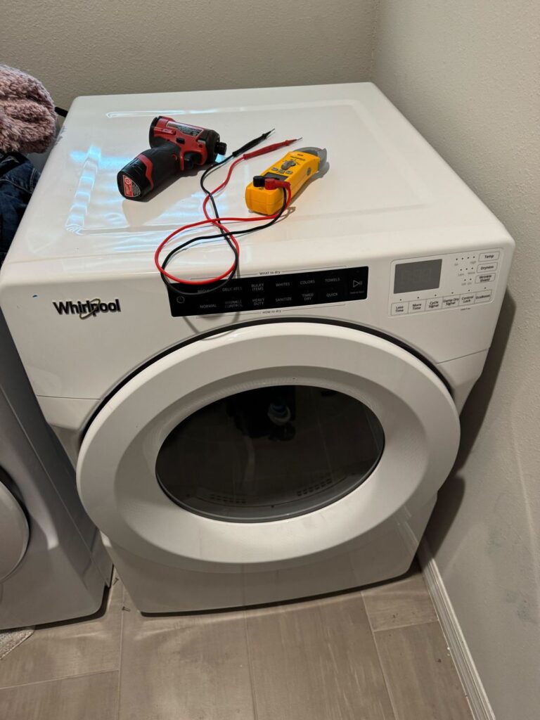 Whirlpool dryer with test tools on top